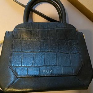 Aritzia original brand Auxiliary like new croc black leather bag.